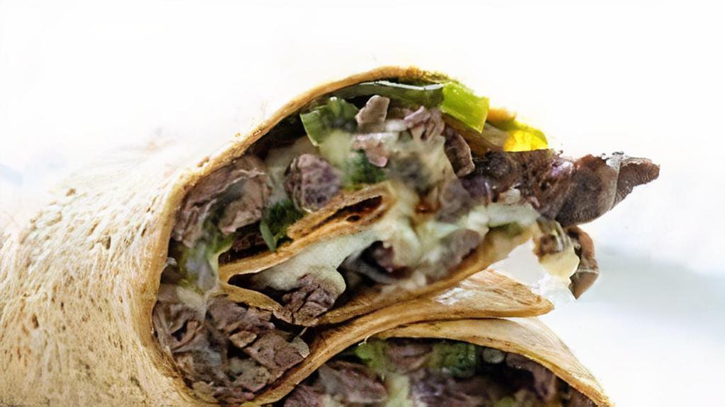Philly Cheesesteak Wrap · 6 oz of  meat, onion, mushroom, cheese, green pepper. mayo .wrapped in tortilla bread