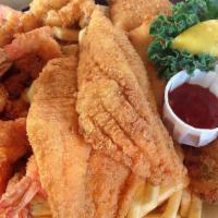 Seafood Basket · 4 pieces swai fishes, 6 pieces shrimps served with fries-coleslaw or potato salad.