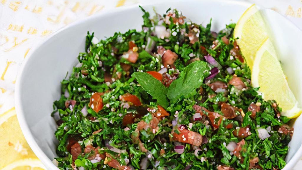Tabouli · ,chopped  onion,  tomatoes , parsley, ,olive oil , lemon juice, salt ,dry mint