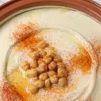 Hummus · ground chickpeas ,lemon juice, tahini sauce , salt