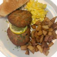 Salmon Croquettes · 2 Salmon Croquettes served with grits, hash browns or home fries with 2 eggs cooked your way...