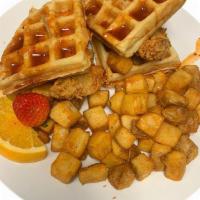 Nashville Sweet & Spicy Chicken & Waffle Sandwich · Fried Golden Chicken and a Belgian Waffle topped with our Sweet & Spicy Nashville sauce serv...