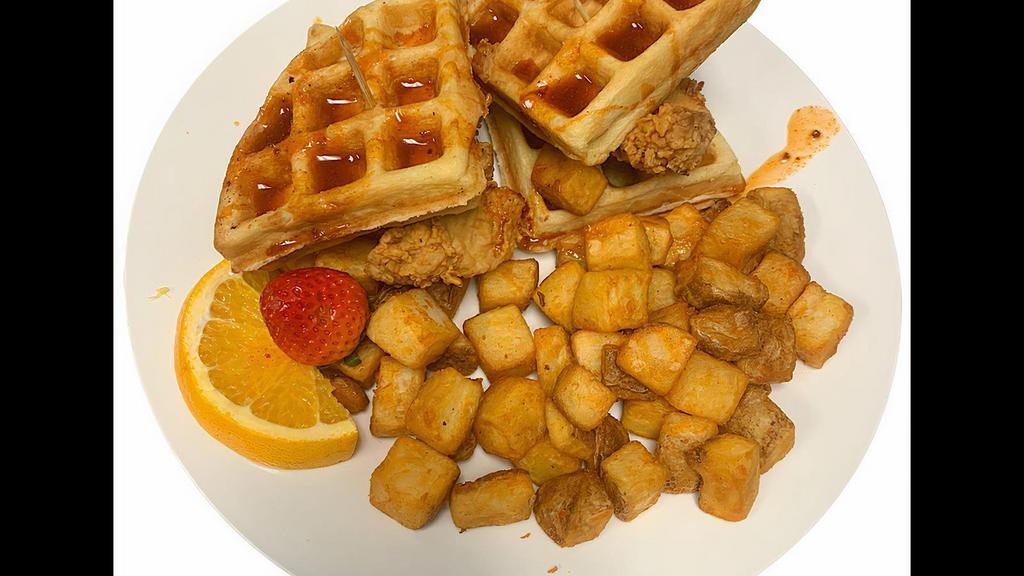 Nashville Sweet & Spicy Chicken & Waffle Sandwich · Fried Golden Chicken and a Belgian Waffle topped with our Sweet & Spicy Nashville sauce served with grits, hash browns or home fries with 2 eggs cooked your way
