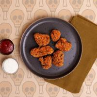 Chicken Nuggets · 12 bites of crispy breaded chicken with your choice of dipping sauce.