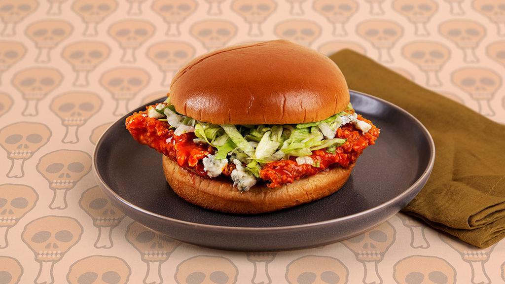 Buffalo Fried Chicken Sandwich · Spicy buffalo fried chicken breast with blue cheese and lettuce on a toasted bun.