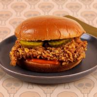 Fried Chicken Sandwich · Fried chicken thighs with pickles and mayo on a buttery brioche bun.