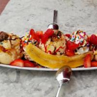 Banana Split · Giant scoops of strawberry, chocolate, vanilla ice cream with strawberries, caramelized bana...
