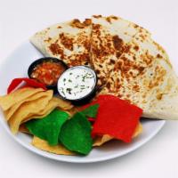 Chicken Quesadilla · Grilled chicken with our blend of spices, melted cheddar, pepper jack cheese, fresh salsa, a...