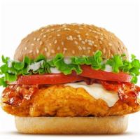 Bacon Ranch Chicken Sandwich · 6 oz fried chicken breast, cheddar cheese, bacon, lettuce, tomato, and ranch dressing on a b...