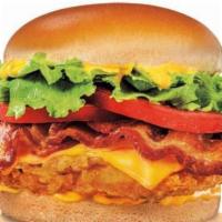 Cheesy Chicken Sandwich · 6 oz fried chicken breast, cheddar cheese, bacon, lettuce, tomato, and chicken sauce on a br...