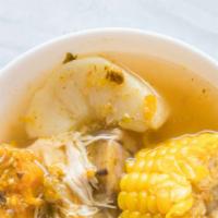 Chicken Soup (Sopa De Pollo) · With arepa and cream.
