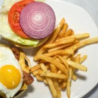 Sunrise Burger · A sunny side up egg on top of burger patty with American cheese and applewood smoked bacon s...