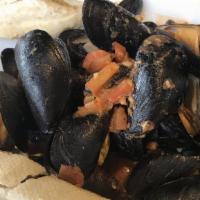 Mussels · Sautéed with your choice of red or white sauce served with toasted bread