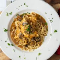 Chicken Marsala · Thinly sliced piece of chicken tenderloin sautéed in a special marsala sauce with garlic and...
