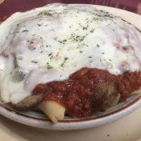 Baked Ziti · Two sausages / two meatballs for an additional charge.