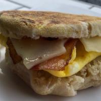 English Muffin Sandwich  · La Bodega bake English muffins, Eggs with our mix veggies(tri-color peppers, zucchini), Swis...