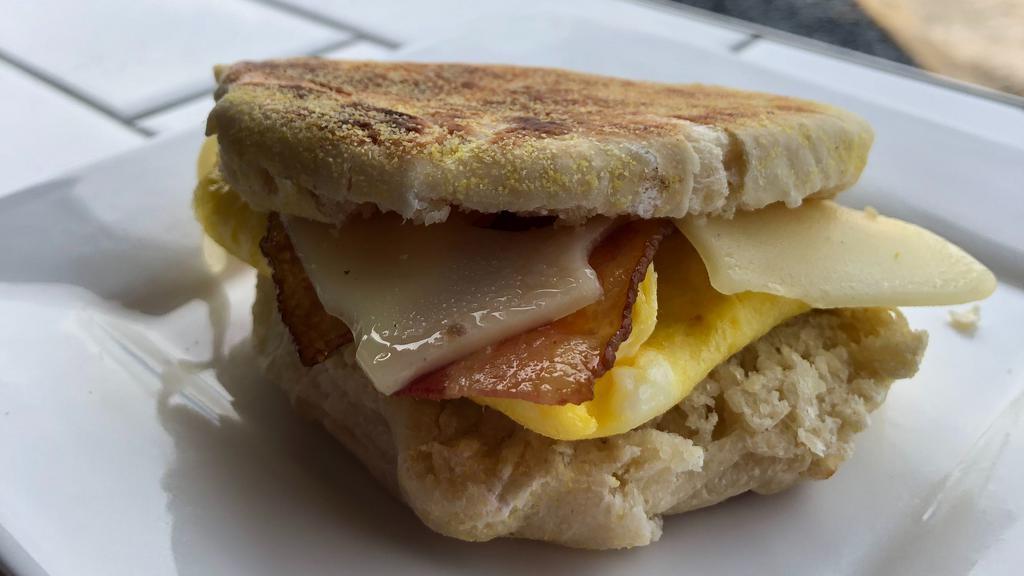 English Muffin Sandwich  · La Bodega bake English muffins, Eggs with our mix veggies(tri-color peppers, zucchini), Swiss cheese, your choice of Bacon, Ham or Canadian Bacon