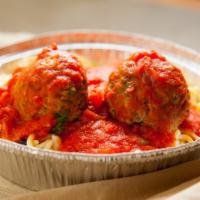 Spaghetti With Meatballs · A classic pasta dish: spaghetti and meatballs. Perfectly cooked spaghetti
topped with tangy ...