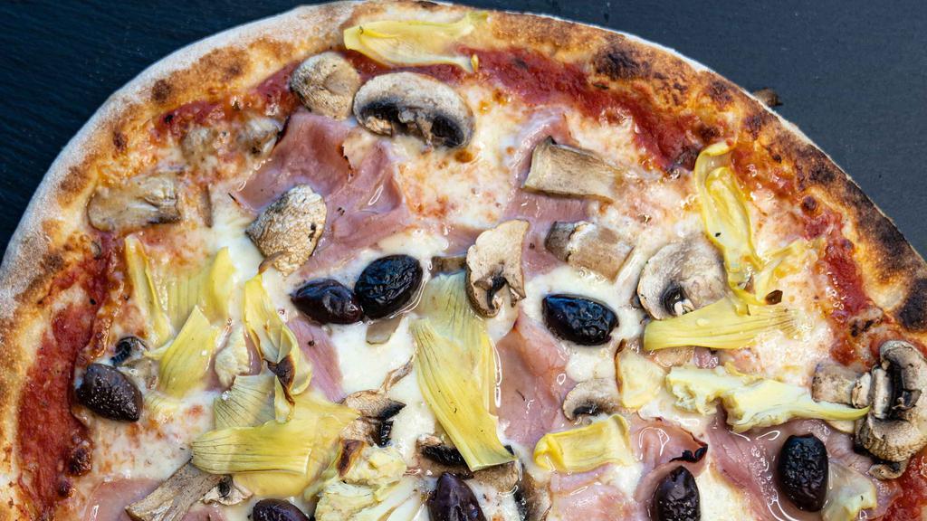 Pizza Capricciosa · TOMATO SAUCE, MOZZARELLA, HAM, MUSHROOM, ARTICHOKE, BLACK. OLIVES KALAMATA