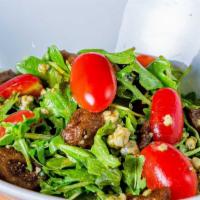 Market Salad · Vegetarian. Arugula, pigs, Gorgonzola, walnuts, cheery tomatoes.