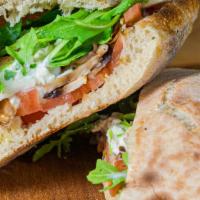 Vegetarian Sandwich · Arugula, cherry tomatoes, burrata, mushrooms and olives.