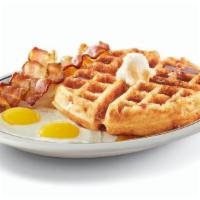 Gluten-Friendly Belgian Waffle Combo · A golden-brown, gluten-friendly Belgian waffle topped with whipped real butter. Served with ...