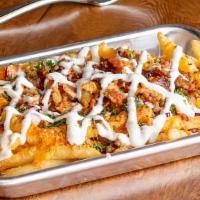 Loaded Fries · fries served with cheddar cheese, smoked bacon, scallions, and ranch dressing