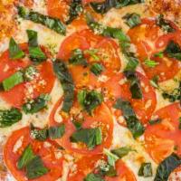 Large Margherita · fresh garlic, Roma tomatoes, basil, topped with mozzarella