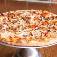 Large Carnivore · pepperoni, ham, Italian sausage, and beef piled on top of mozzarella cheese