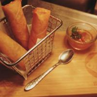 Spring Rolls · Vegetarian. Deep fried vegetarian spring rolls with homemade sweet and sour sauce.