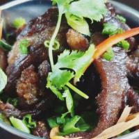 Beef Jerky · Thai style beef jerky with sticky rice.