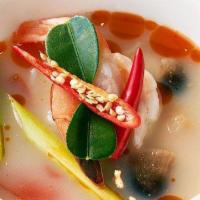 Tom Yum Shrimp · Spicy-mild. Lemongrass broth, mushrooms, cilantro, and green onions with a touch of fresh li...