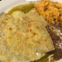 Enchiladas Verdes · 3 corn tortillas with chicken sauteed in ranchero sauce topped with tomatillo sauce, melted ...