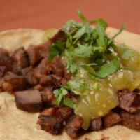 Tacos De Lengua De Res (3) · 3 pieces. Rice, beans, and pico de gallo.
