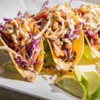 Baja Tacos · Three flour or corn tortillas filled with fish, grilled, blackened, or fried, topped with re...