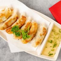 Gyoza · Deep fried or steamed pork dumpling.