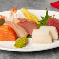 Sashimi Appetizer · Seven pcs of raw fish (chef's choice). * 
 
*Uncooked item. Consuming raw or undercooked mea...