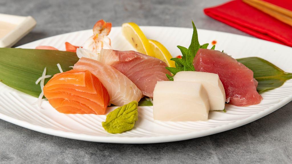 Sashimi Appetizer · Seven pcs of raw fish (chef's choice). * 
 
*Uncooked item. Consuming raw or undercooked meats, poultry, seafood, shellfish or eggs may increase the risk of food borne illness, especially if you have medical conditions