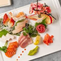 Sashimi Deluxe · 18 pcs raw fish (chef's choice). * 
 
*Uncooked item. Consuming raw or undercooked meats, po...
