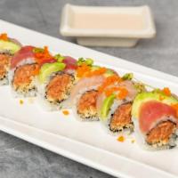 Sr36. Hawaii Roll · Spicy white tuna and crunchy bites inside with tuna, yellowtail, avocado, fish eggs and scal...