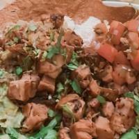 Pollo Asado Taco · Two 24hr marinated grilled chicken tacos, guacamole, diced yellow onion & fresh cilantro. Se...