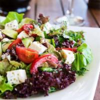 Mediterranean Salad · Romaine with tomatoes, cucumbers, feta, and olives.