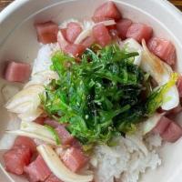 Traditional Tuna Poke Bowl · Shoyu sauce, sea salt, maui onions, and seaweed.