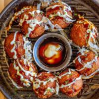 Fried Takoyaki Balls · Japanese octopus balls with mayo, fish flakes.