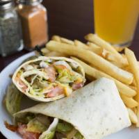 Veggie Wrap · Grilled onions, banana peppers, mushrooms, lettuce, tomatoes, cheese and dressing.