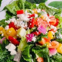 Greek Salad With Romaine Lettuce, Tomato, Feta Cheese, Red And Yellow Pepper, Red Onion · 