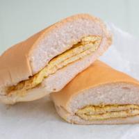 Deluxe Egg Ham And Cheese Sandwich · Deluxe Egg ham and cheese.