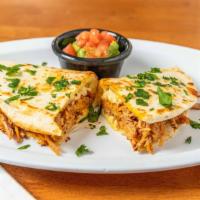 Quesadillas Mx · Flour tortilla with mozzarella cheese, stuffed with cochinita