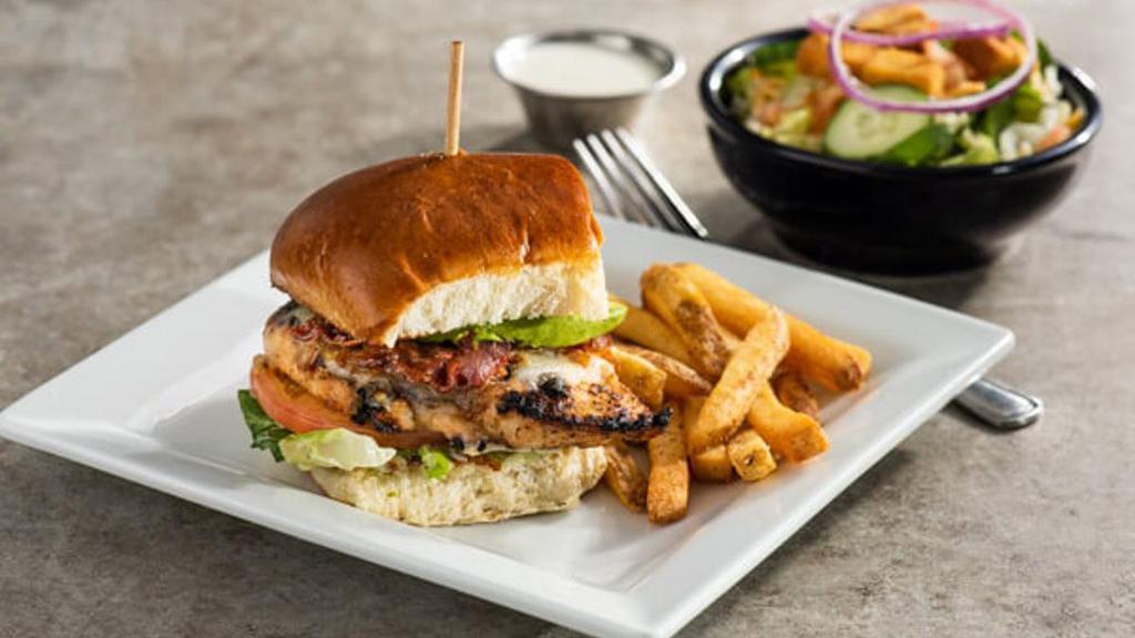 Lunch Combo - Bacon Avocado Grilled Chicken Sandwich · Half sandwich with grilled chicken, bacon, swiss, avocado, sauteed onions, lettuce, tomato, cilantro-pesto mayo on a toasted buttery roll. Served with fries.