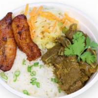 Curry Goat · Fork Tender Goat, Jasmine Rice, Sautéed Cabbage, Sweet Plantains